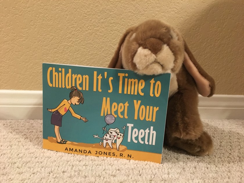 Caramel enjoyed learning more about teeth in Amanda Jones' Children It's Time to Meet Your Teeth.