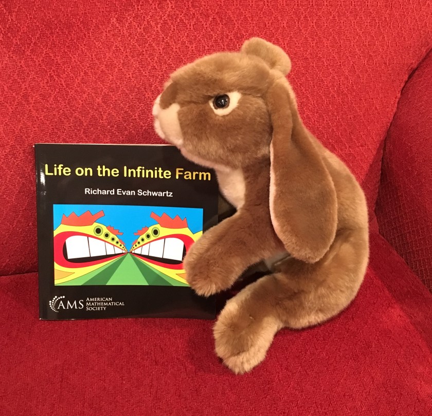 Caramel enjoys reading and rereading bits and pieces of Life on the Infinite Farm by Richard Evan Schwartz.