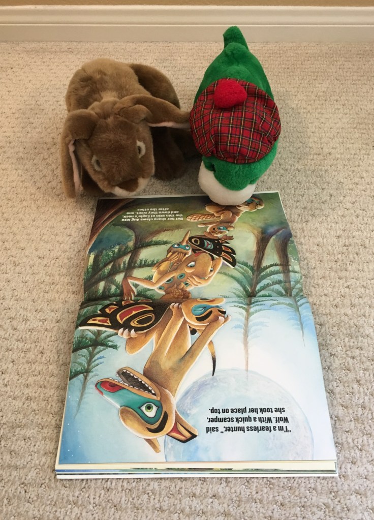 Caramel and his friend the Loch Ness Monster are reading Totem Tale: A Tall Story from Alaska together. 