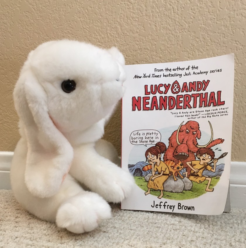 Marshmallow reviews Lucy & Andy Neanderthal by Jeffrey Brown.  