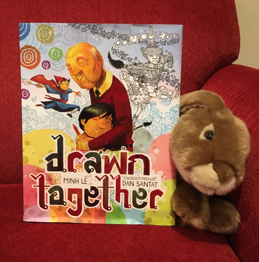 Caramel enjoyed reading Drawn Together, written by Minh Le and illustrated by Dan Santat. 