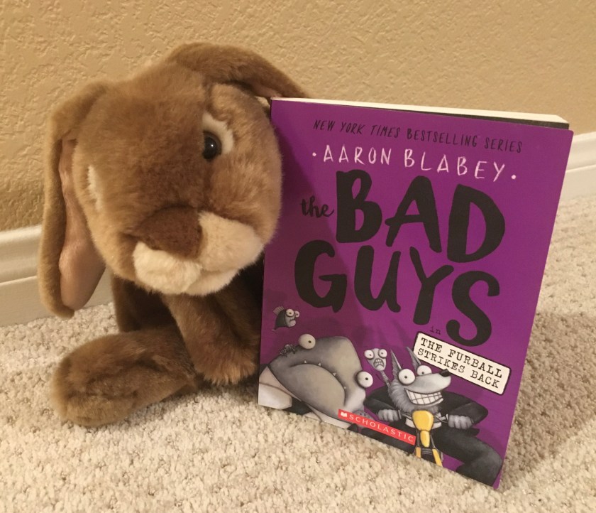 Caramel really enjoyed reading The Bad Guys in The Furball Strikes Back by Aaron Blabey (Bad Guys #3) and is looking forward to reading more about their adventures. 