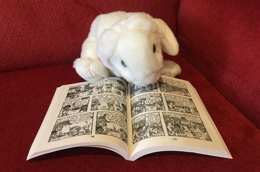 Marshmallow is pointing the reader to the pages of Lucy and Andy Neanderthal: Bad to the Bones (the third book in the Lucy and Andy Neanderthal series) by Jeffrey Brown, where Andy burns things up in order to eradicate lice. 