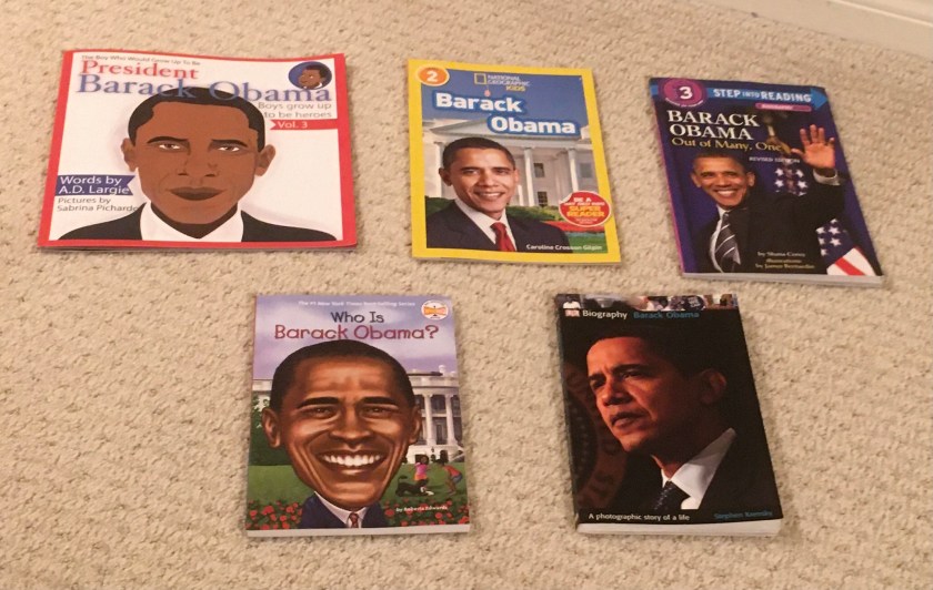 In this photo, Sprinkles organized the books in this review in the order of reader level: President Barack Obama by A.D. Largie and Sabrina Pichardo, Barack Obama by Caroline Crosson Gilpin, Barack Obama: Out of Many, One by Shana Corey and James Bernardin, Who Is Barack Obama? by Roberta Edwards and John O'Brien, and Barack Obama by Stephen Krensky.