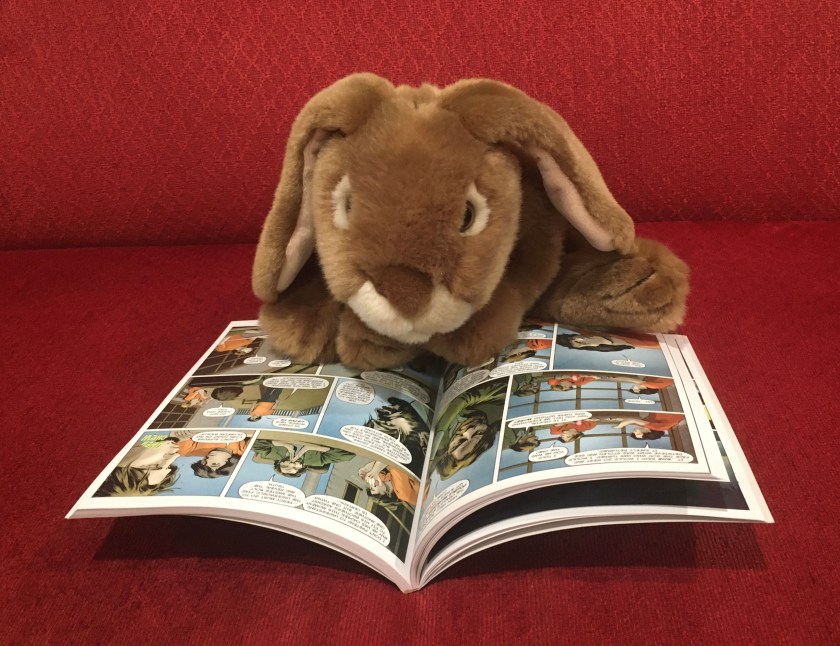 Caramel is reading The Lightning Thief: The Graphic Novel, written by Rick Riordan, and adapted by Robert Venditti, with Attila Futaki, Jose Villarrubia, Orpheus Collar, and Chris Dickey.