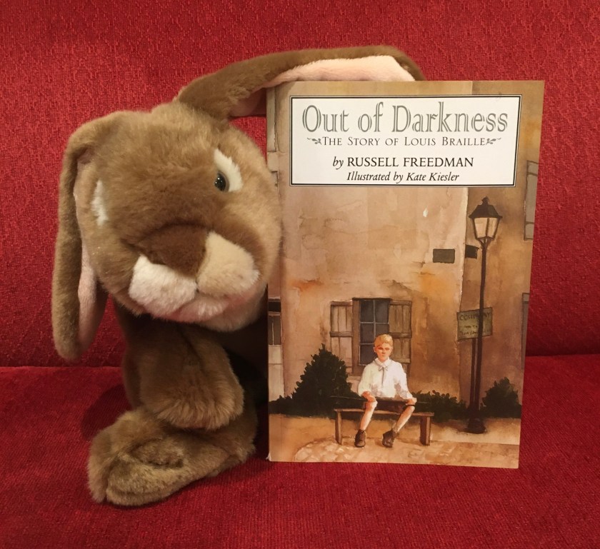 Caramel has appreciated reading Out of Darkness: The Story of Louis Braille, written by Russell Freedman and illustrated by Kate Kiesler, and recommends it to other little bunnies who might like to learn about a young person who overcame big obstacles and achieved great things.