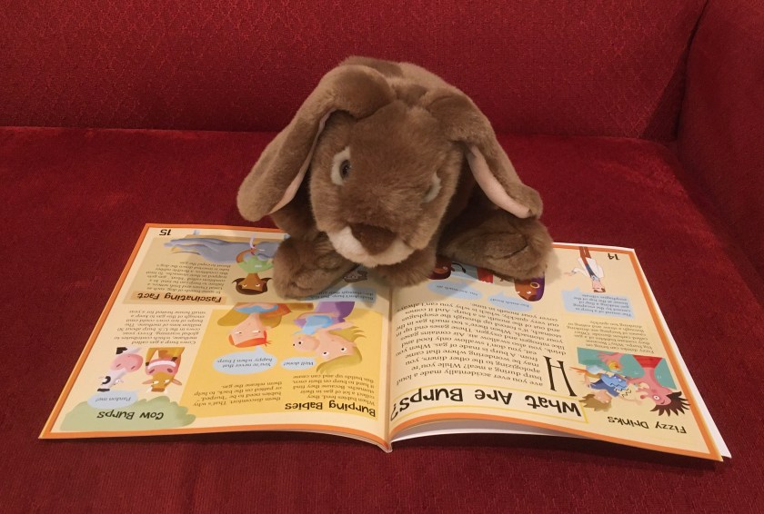 Caramel is reading The Science of Poop and Farts: The Smelly Truth About Digestion by Alex Woolf.