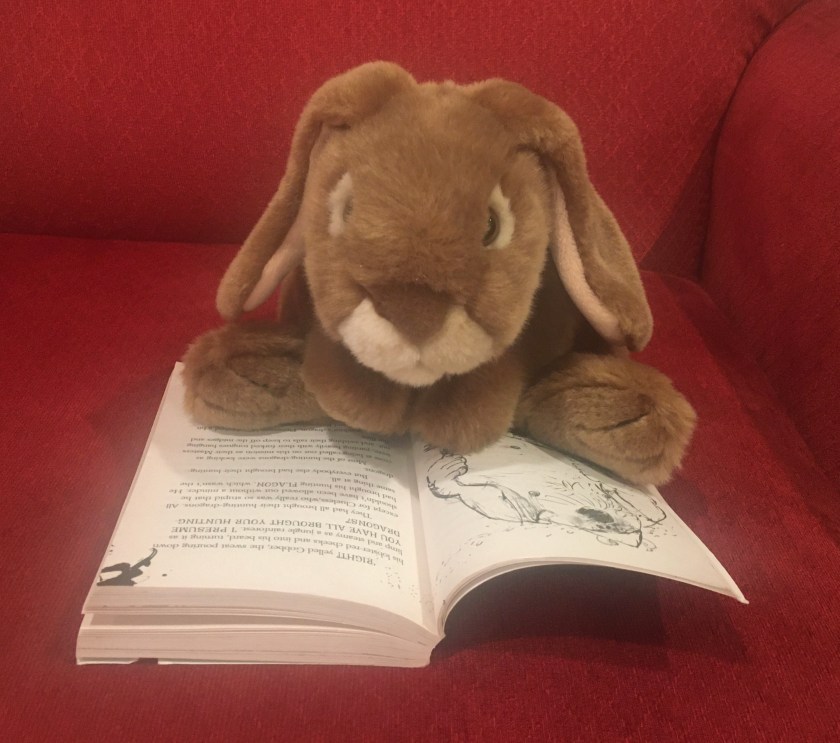 Caramel is reading How to Twist a Dragon’s Tale (Book #5 of How to Train Your Dragon Series) by Cressida Cowell.