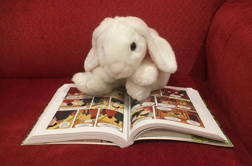 Marshmallow is reading Logicomix, written by Apostolos Doxiadis and Christos H. Papadimitriou, and illustrated by Alecos Papadatos and Annie di Donna.