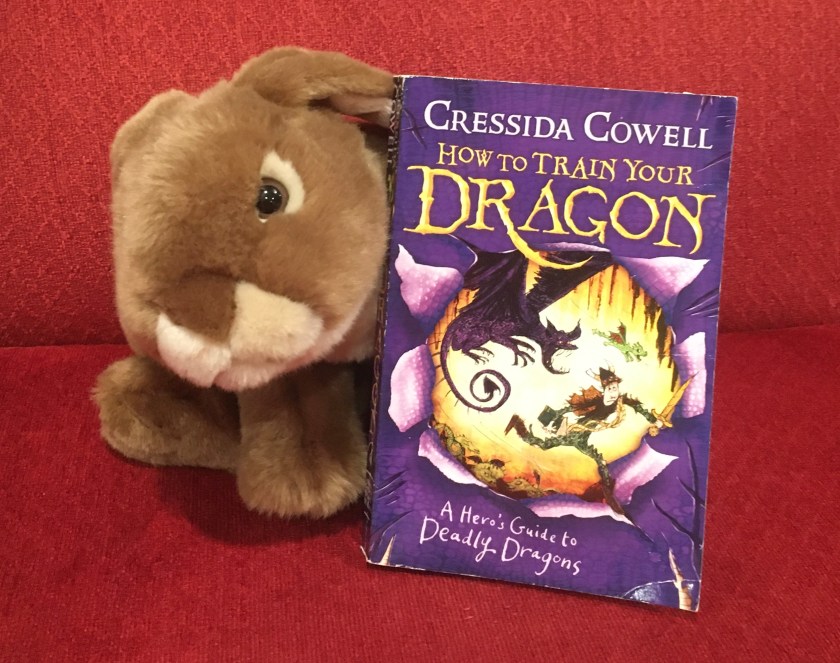 Caramel reviews A Hero's Guide to Deadly Dragons (Book #6 of How to Train Your Dragon Series) by Cressida Cowell.