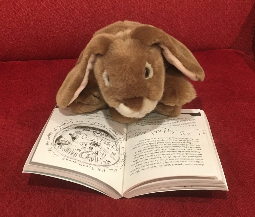 Caramel is reading How To Break A Dragon’s Heart (Book #8 of How to Train Your Dragon Series) by Cressida Cowell.