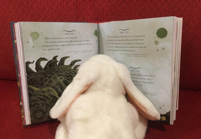 Marshmallow is reading the pages corresponding to May 24, May 25, and May 26, in Harry Potter: A Magical Year - The Illustrations of Jim Kay by J.K. Rowling and Jim Kay.