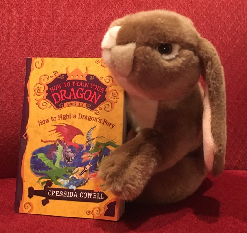 Caramel reviews How to Fight a Dragon's Fury (Book #12 of How to Train Your Dragon Series) by Cressida Cowell.