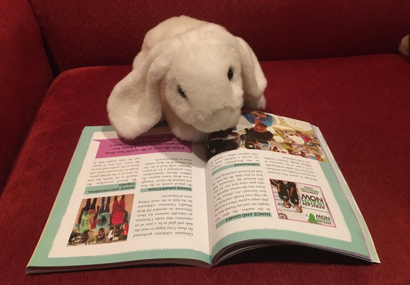 Marshmallow is reading Marley Dias Gets It Done And So Can You! by Marley Dias.