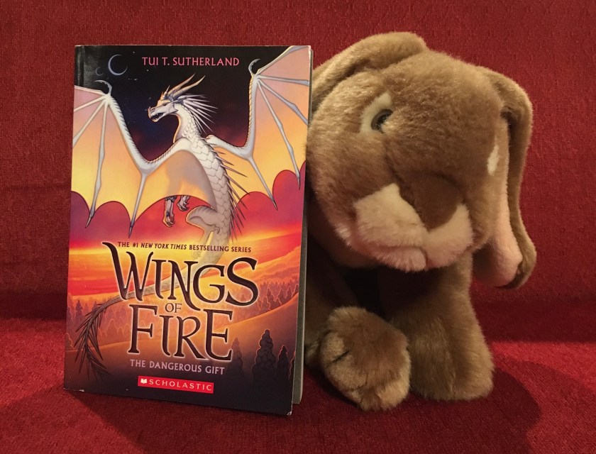 Caramel reviews The Dangerous Gift (Book Fourteen of the Wings of Fire series) by Tui Sutherland.