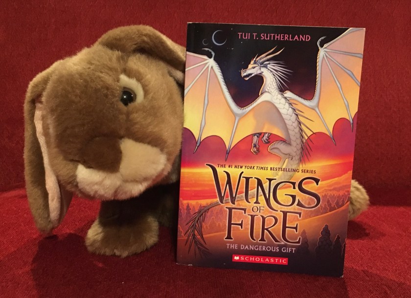 Caramel enjoyed reading The Dangerous Gift (Book Fourteen of the Wings of Fire series) by Tui Sutherland, and is eager to dive into the fifteenth book. But the readers of the blog will need to wait until August to read his thoughts about that book.
