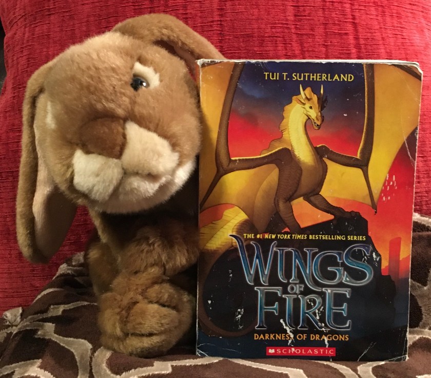 Caramel reviews Darkness of Dragons (Book Ten of the Wings of Fire series) by Tui Sutherland.