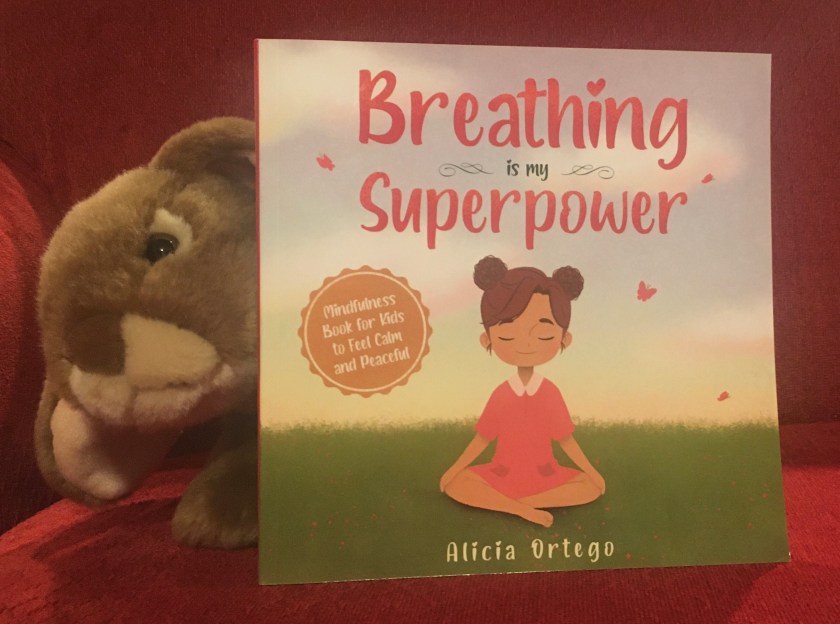 Caramel enjoyed reading Breathing is My Superpower by Alicia Ortego, and he recommends it to young bunnies and their adults to read together and discuss relaxation methods, practicing them along the way.