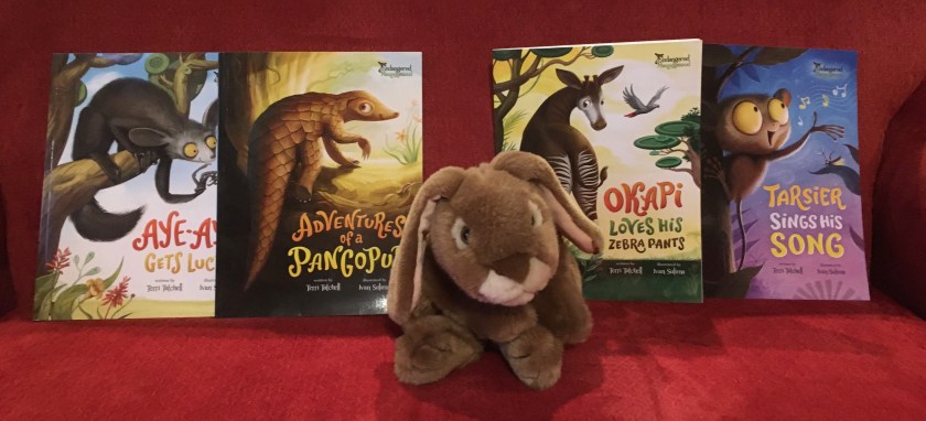 Caramel reviews Aye-Aye Gets Lucky, Adventures of a Pangopup, Okapi Loves His Zebra Pants, and Tarsier Sings His Song, the four books making up the Endangered and Misunderstood Animals series written by Terri Tatchell and illustrated by Ivan Sulima.