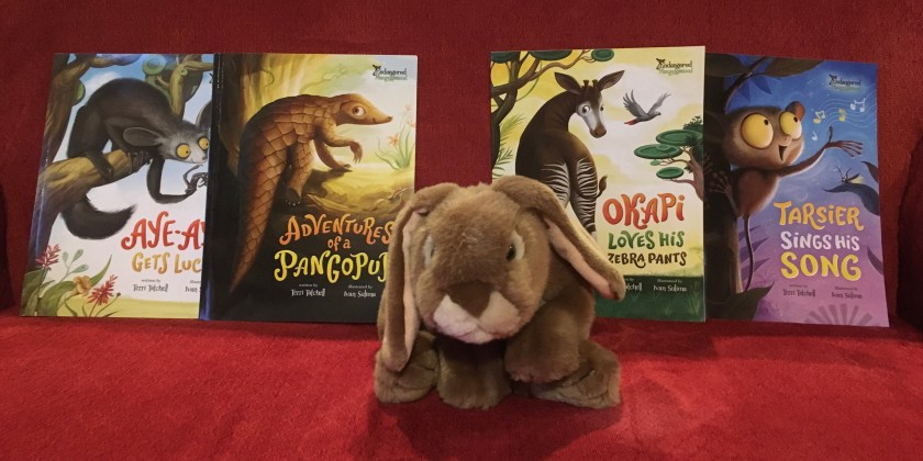 Caramel loved reading Aye-Aye Gets Lucky, Adventures of a Pangopup, Okapi Loves His Zebra Pants, and Tarsier Sings His Song, the four books making up the Endangered and Misunderstood series written by Terri Tatchell and illustrated by Ivan Sulima, and he encourages other little bunnies to read them too. 