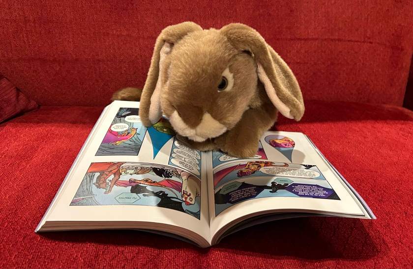 Caramel is reading Moon Rising (the graphic novel version of Book Six of Wings of Fire) by Tui Sutherland and Mike Holmes.