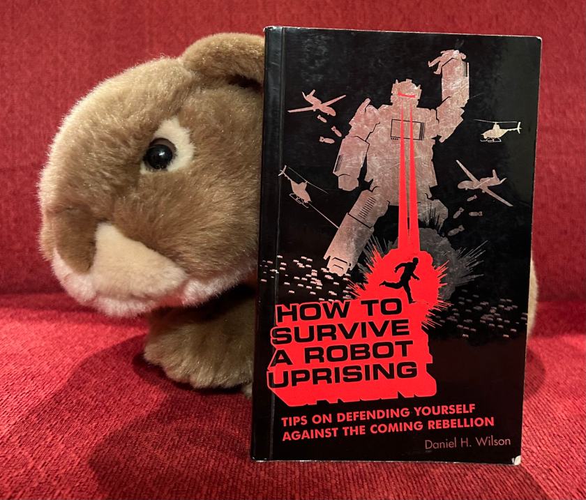 Caramel hopes that he will never need any of the defensive methods he read about in How to Survive a Robot Uprising: Tips on Defending Yourself Against the Coming Rebellion by Daniel H. Wilson, but he also thinks it is better to be safe than sorry. 