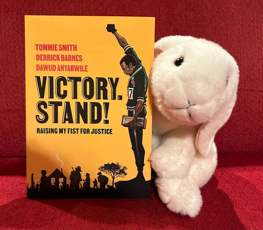 Marshmallow reviews Victory. Stand! Raising My Fist for Justice, by Tommie Smith, written together with Derrick Barnes and illustrated by Dawud Anyabwile.
