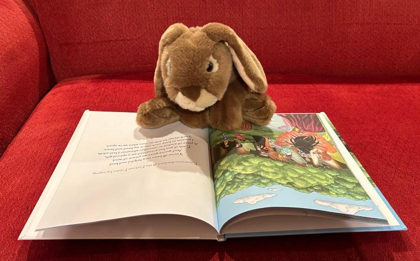 Caramel is reading Hope and Fortune by Marissa Bañez.