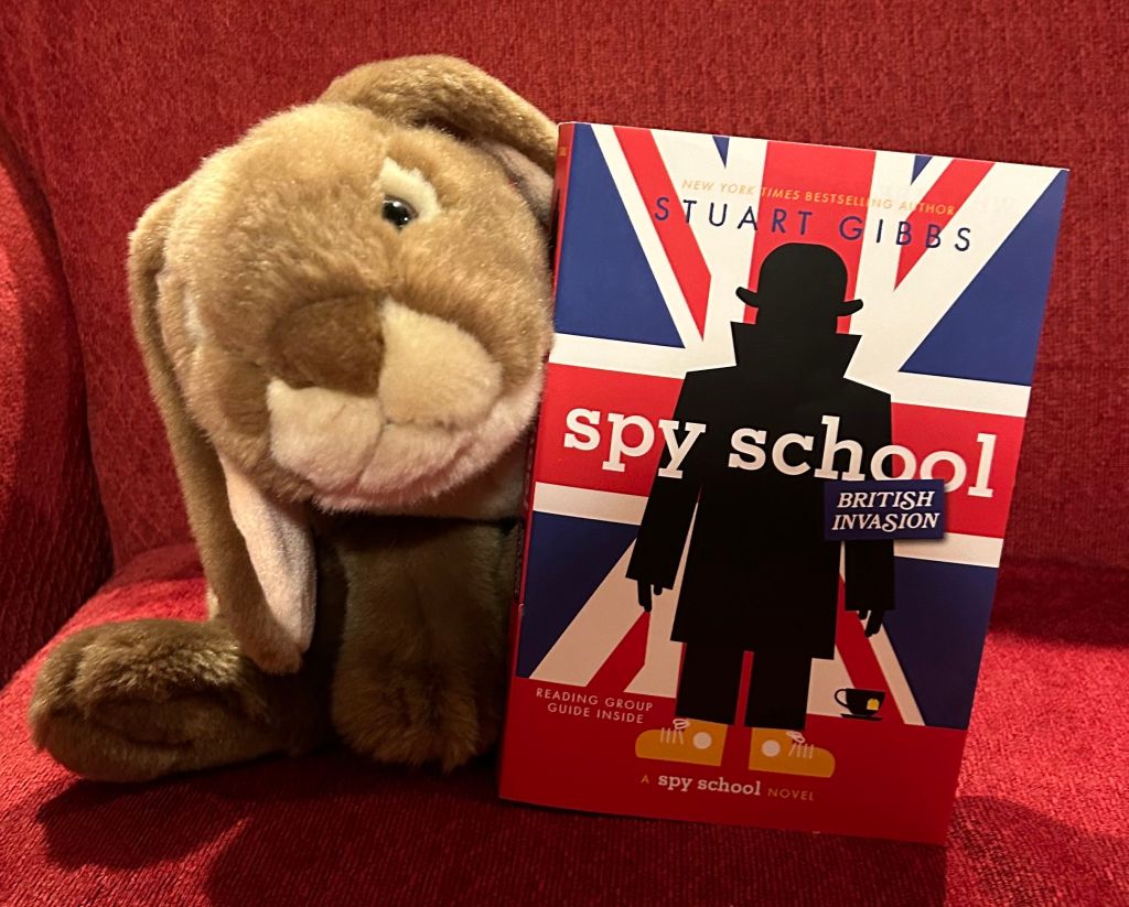 Caramel loved reading Spy School: British Invasion by Stuart Gibbs and cannot wait to get his paws on Book Eight. 