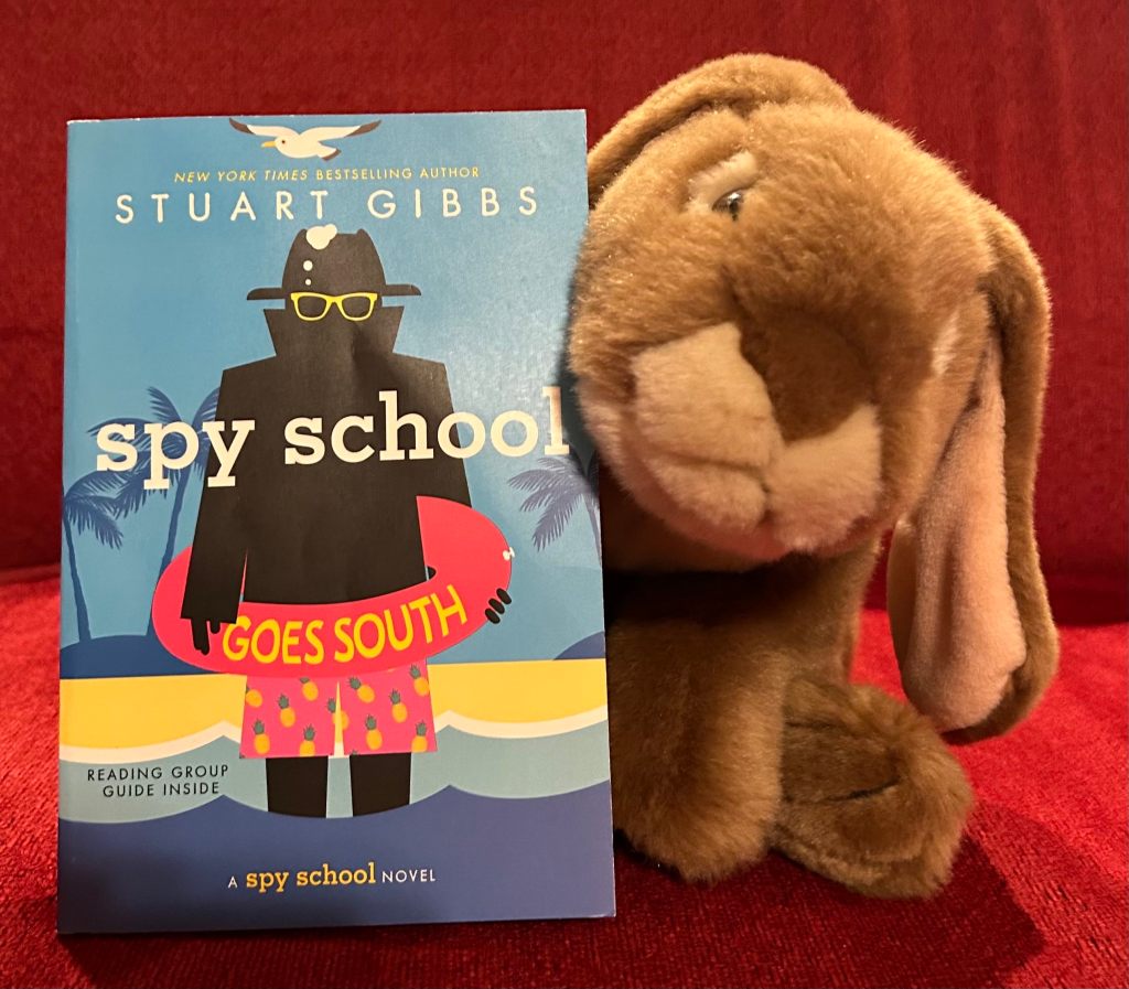 Caramel enjoyed reading Spy School Goes South by Stuart Gibbs and is ready for Book Seven!