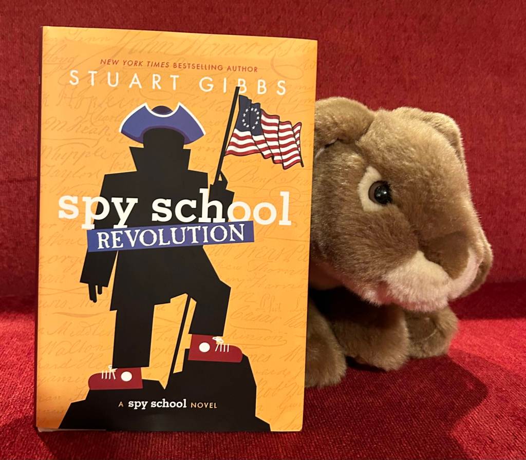 Some of Caramel's favorite Spy School books. 