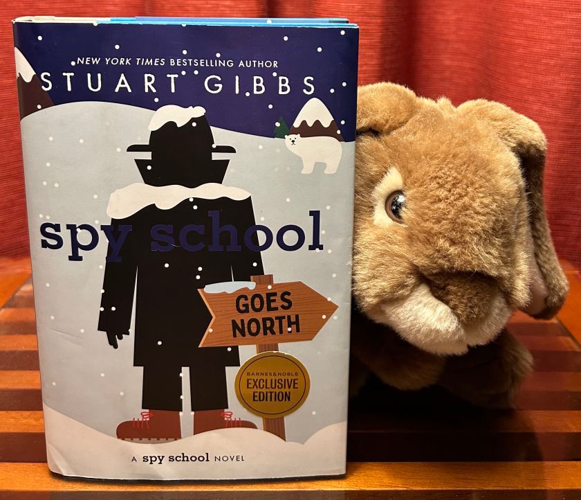 Caramel loved reading Spy School Goes North by Stuart Gibbs and now does not know what to do with himself as there is as of yet not a twelfth book in the series.