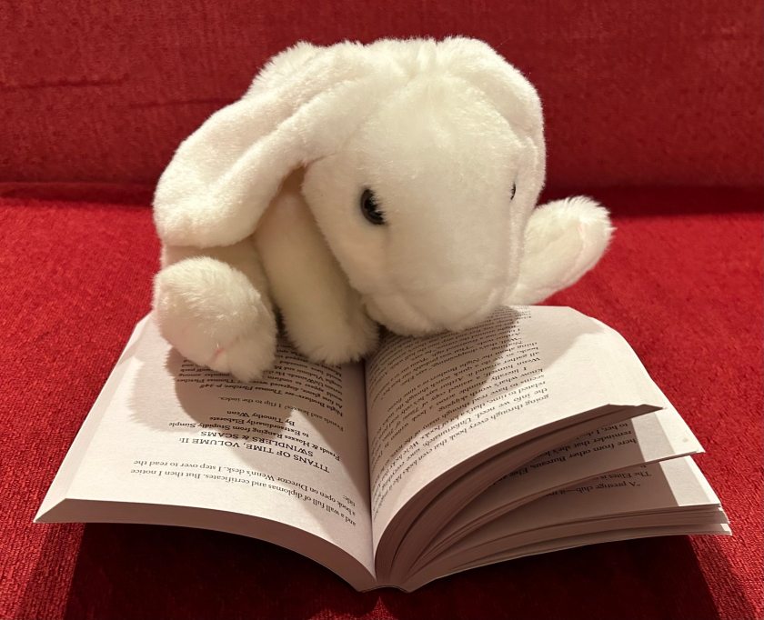 Marshmallow is reading Amari and the Great Game by B.B. Alston.