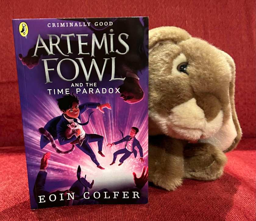 Caramel enjoyed reading Artemis Fowl and the Time Paradox by Eoin Colfer and is ready for book seven.