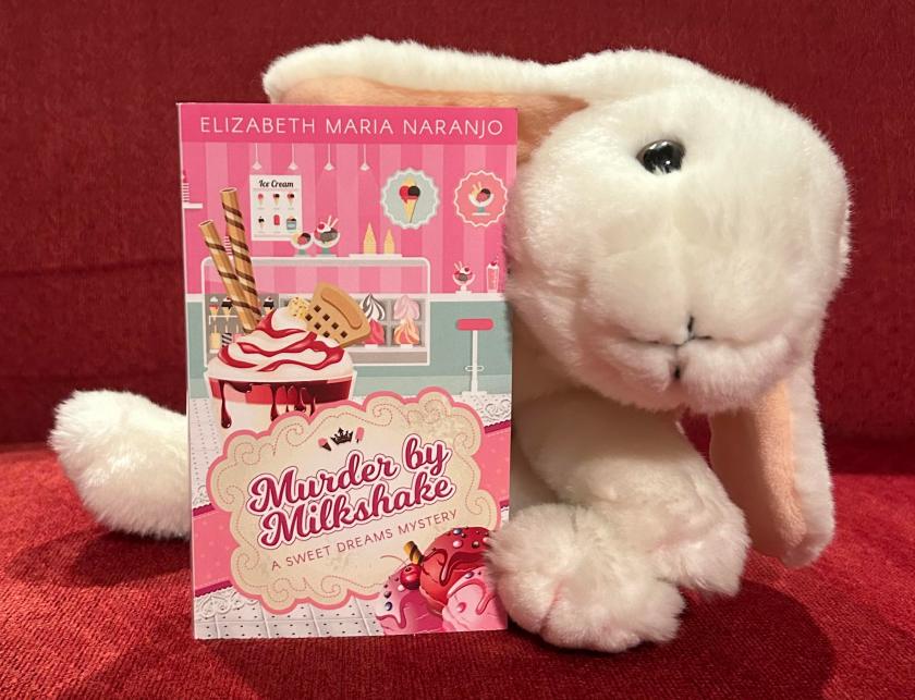 Marshmallow reviews Murder by Milkshake: A Sweet Dreams Mystery by Elizabeth Maria Naranjo.