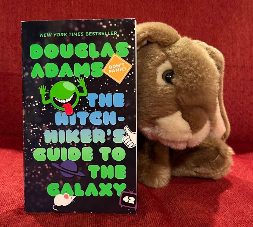 Caramel reviews The Hitchhiker's Guide to the Galaxy by Douglas Adams.