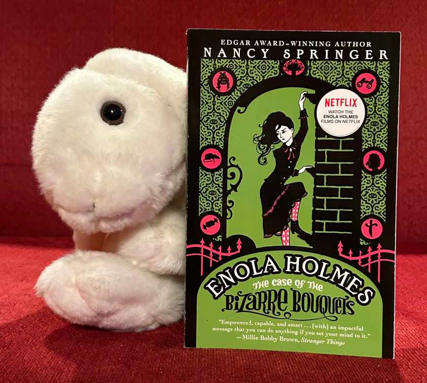 Marshmallow reviews Enola Holmes: The Case of the Bizarre Bouquets by Nancy Springer.