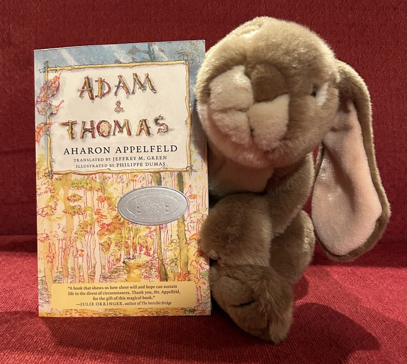 Caramel appreciated reading Adam & Thomas, written by Aharon Appelfeld, translated into English by Jeffrey M. Green, and illustrated by Philippe Dumas, and thinks it is a good story to teach little bunnies about what happened to some young children during World War II. 