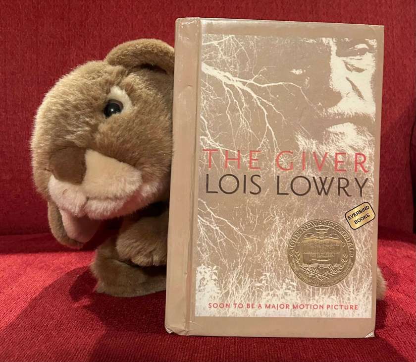 Caramel has enjoyed reading The Giver by Lois Lowry and is curious about the other books its author wrote as sequels.