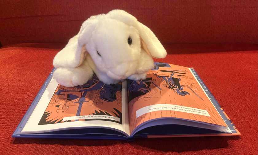 Marshmallow is reading Zenobia, written by Morten Dürr and illustrated by Lars Horneman.