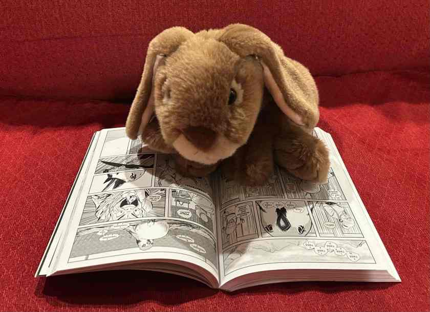 Caramel is reading Tamamo the Fox Maiden and Other Asian Stories, edited by C. Spike Trotman, Kate Ashwin, and Kel McDonald.