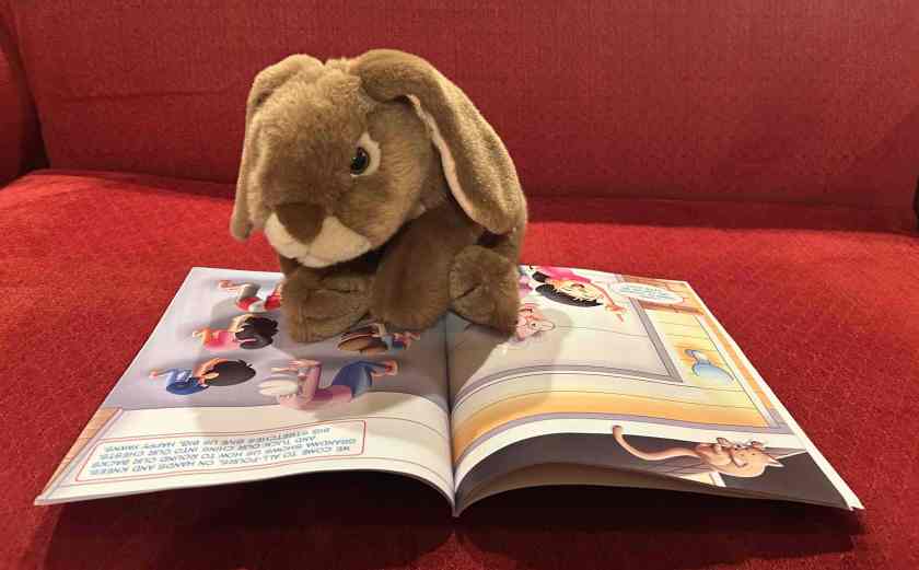 Caramel is reading Grandma Yogini, written by Raven Howell and illustrated by Alexander Santos.