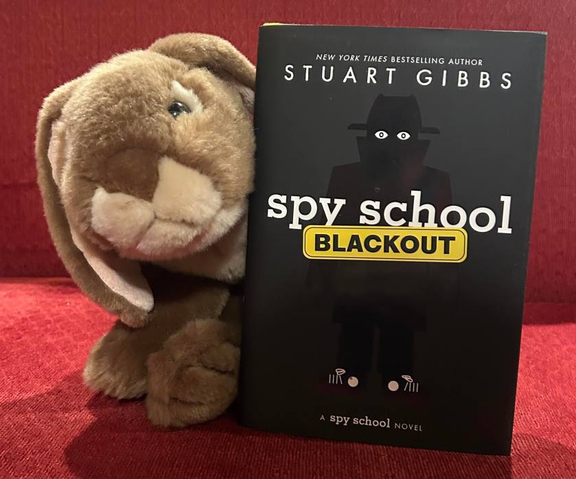 Caramel was delighted to read Spy School Blackout by Stuart Gibbs, and is hopeful that there will soon be a fourteenth book, or at least maybe a graphic novelization of some of the earlier books. 