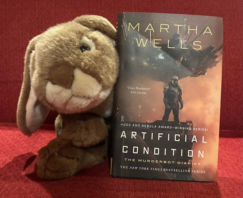 Caramel reviews Artificial Condition: The Murderbot Diaries by Martha Wells.