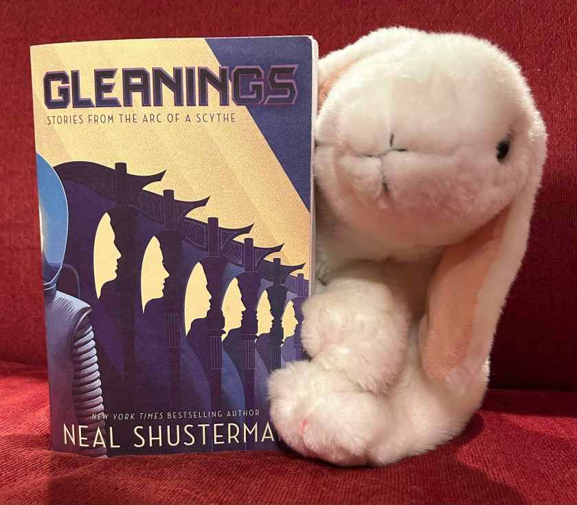 Marshmallow reviews Gleanings: Stories from the Arc of a Scythe by Neal Shusterman.