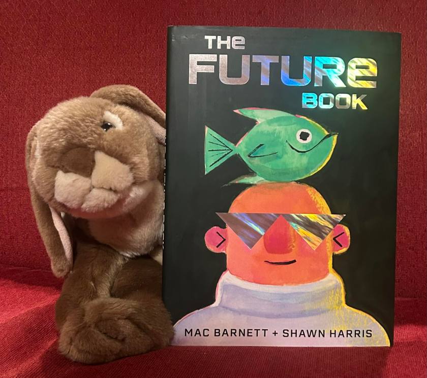Caramel enjoyed reading The Future Book by Mac Barnett and Shawn Harris and is curious to see if the future will really turn out so wacky. 