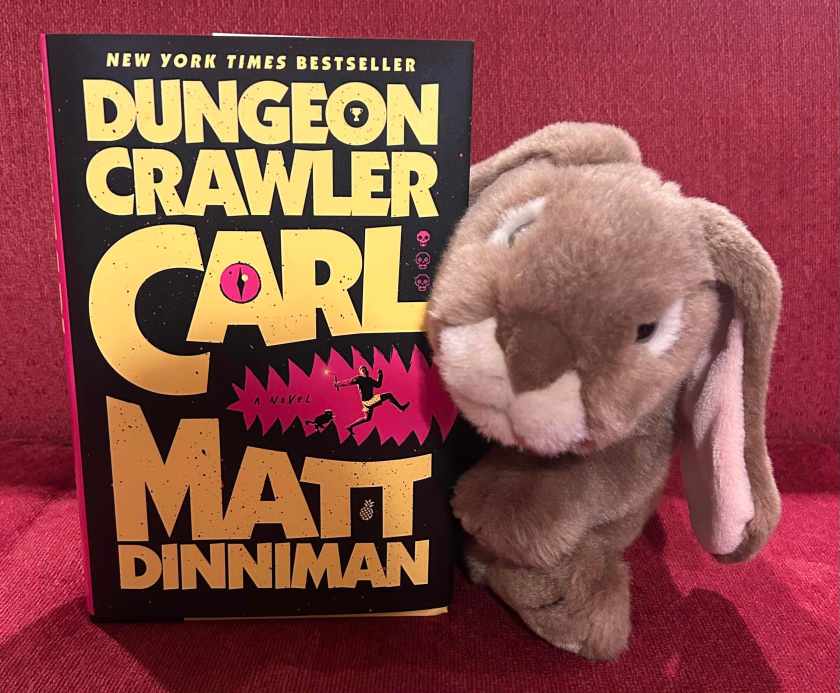 Caramel reviews Dungeon Crawler Carl by Matt Dinniman.