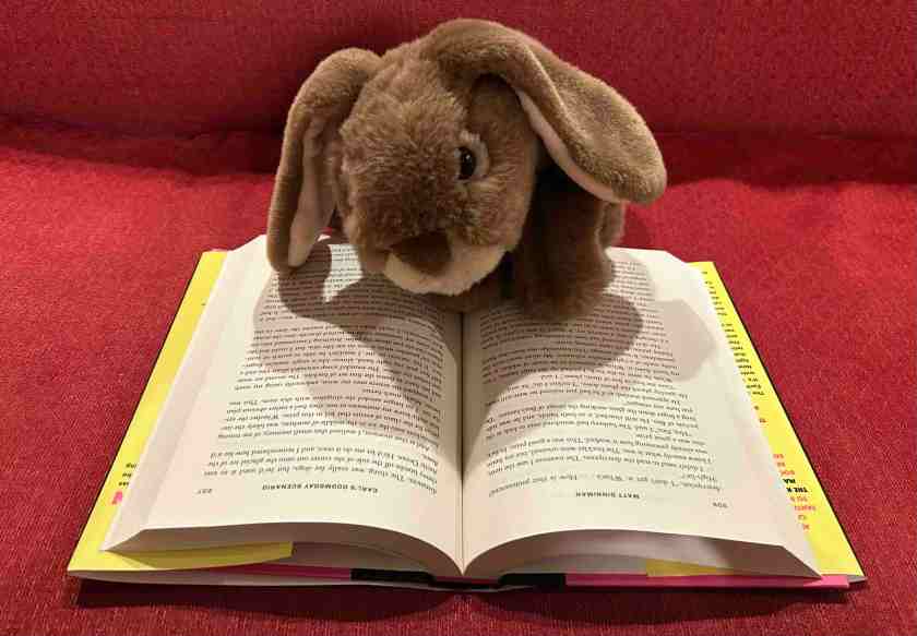 Caramel is reading Carl's Doomsday Scenario by Matt Dinniman.